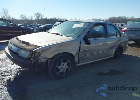 1999 Nissan Sentra Gxe/Xe z USA, uszkodzony, nr VIN 1N4AB41D7XC711958